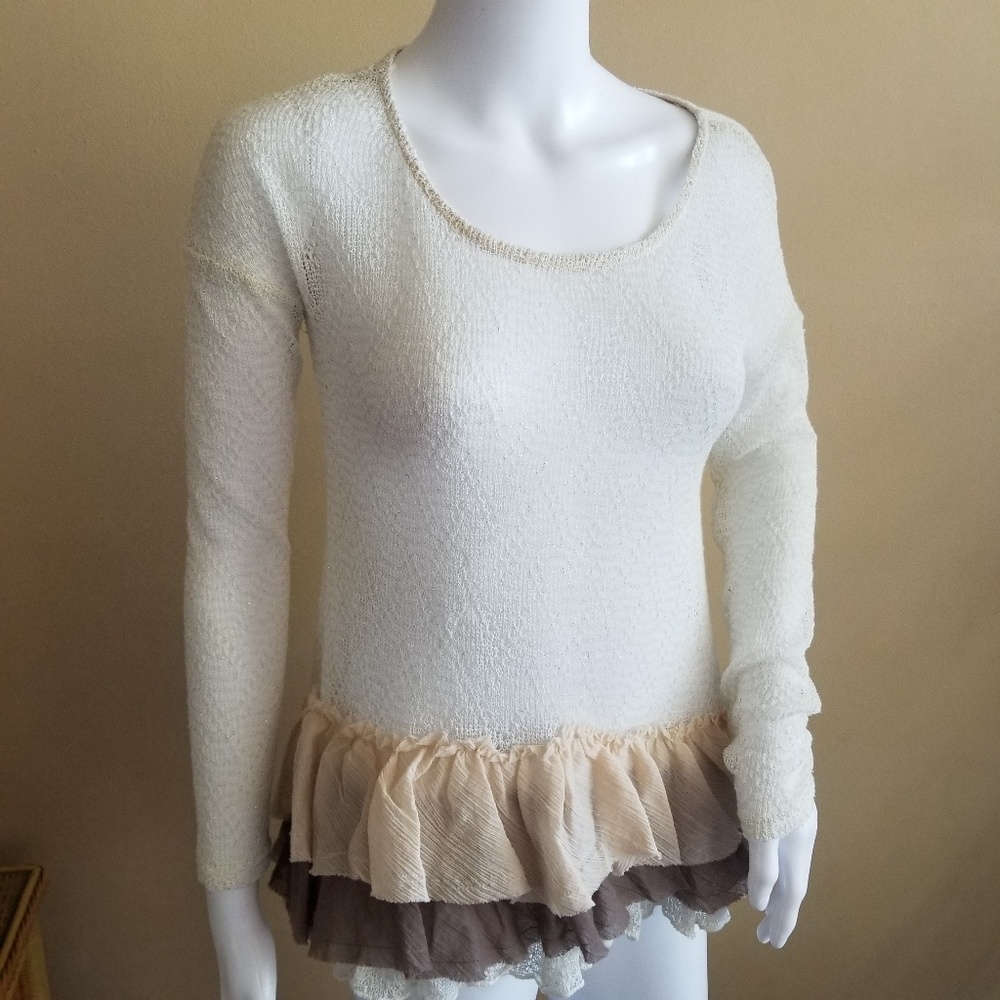 Anthropologie A Reve lace and ruffled top.